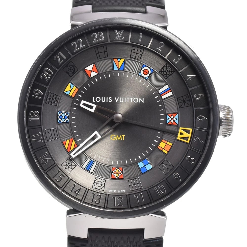 LOUIS VUITTON TAMBOUR MOON DUAL TIME QUARTZ WATCH: Louis Vuitton Tambour Moon Dual Time Quartz Watch Brand: LOUIS VUITTON Type/Style: Wristwatch Material: Band Material rubber, Case Material Stainless Steel Color: Case Color Silver, Band Color black,