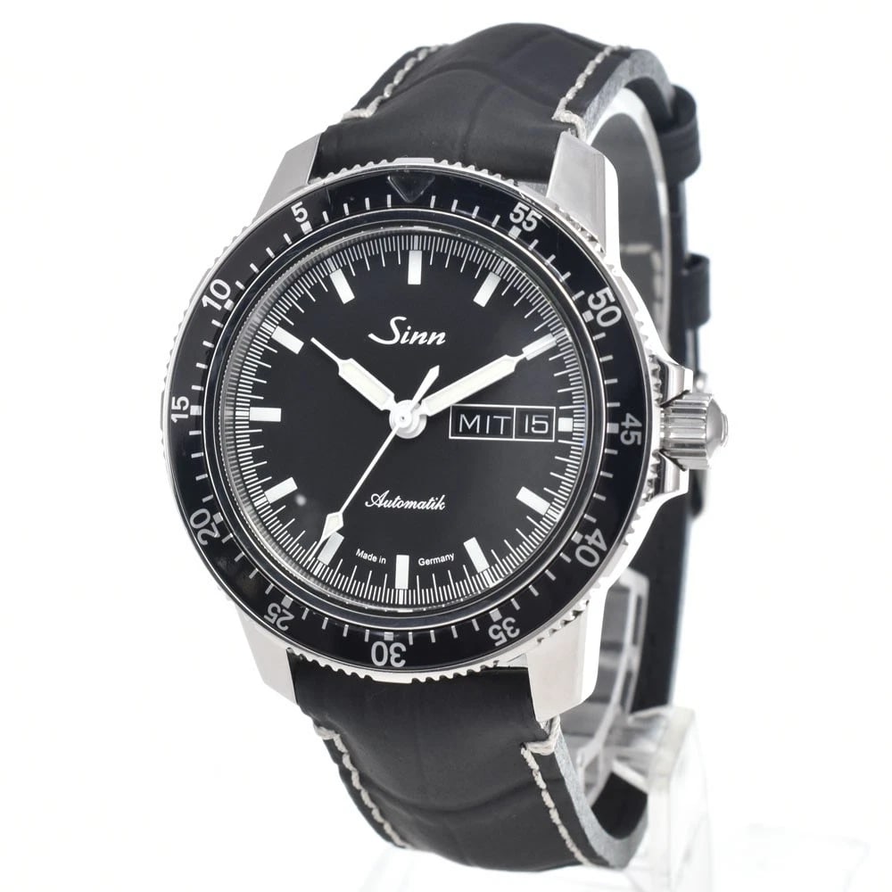SINN 104 PILOT'S WATCH DAY DATE AUTOMATIC WATCH: Sinn 104 Pilot'S Watch Day Date Automatic Watch Brand: Sinn Type/Style: Wristwatch Material: Band Material rubber, Case Material Stainless Steel Color: Case Color Silver, Band Color black, Dial Color