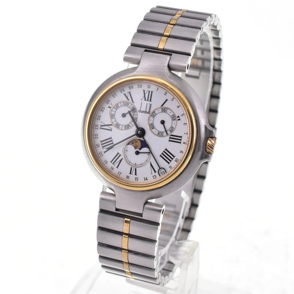 DUNHILL MILLENNIUM TRIPLE CALENDAR MOON PHASE QUARTZ UNISEX WATCH: Dunhill Millennium Triple Calendar Moon Phase Quartz Unisex Watch Brand: Dunhill Type/Style: Wristwatch Material: Band Material Stainless Steel/Gold Plated, Case Material Stainless Steel/Gold Plated