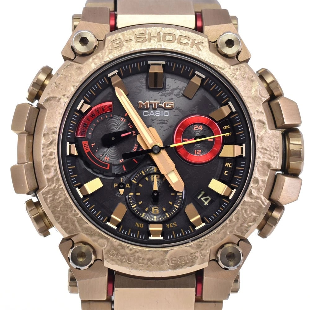 CASIO G-SHOCK WATCH: Casio G-Shock Watch Brand: CASIO Type/Style: Wristwatch Material: Band Material Stainless Steel, Case Material Stainless Steel / Carbon Color: Case Color gold, Band Color gold, Dial Color black Size: