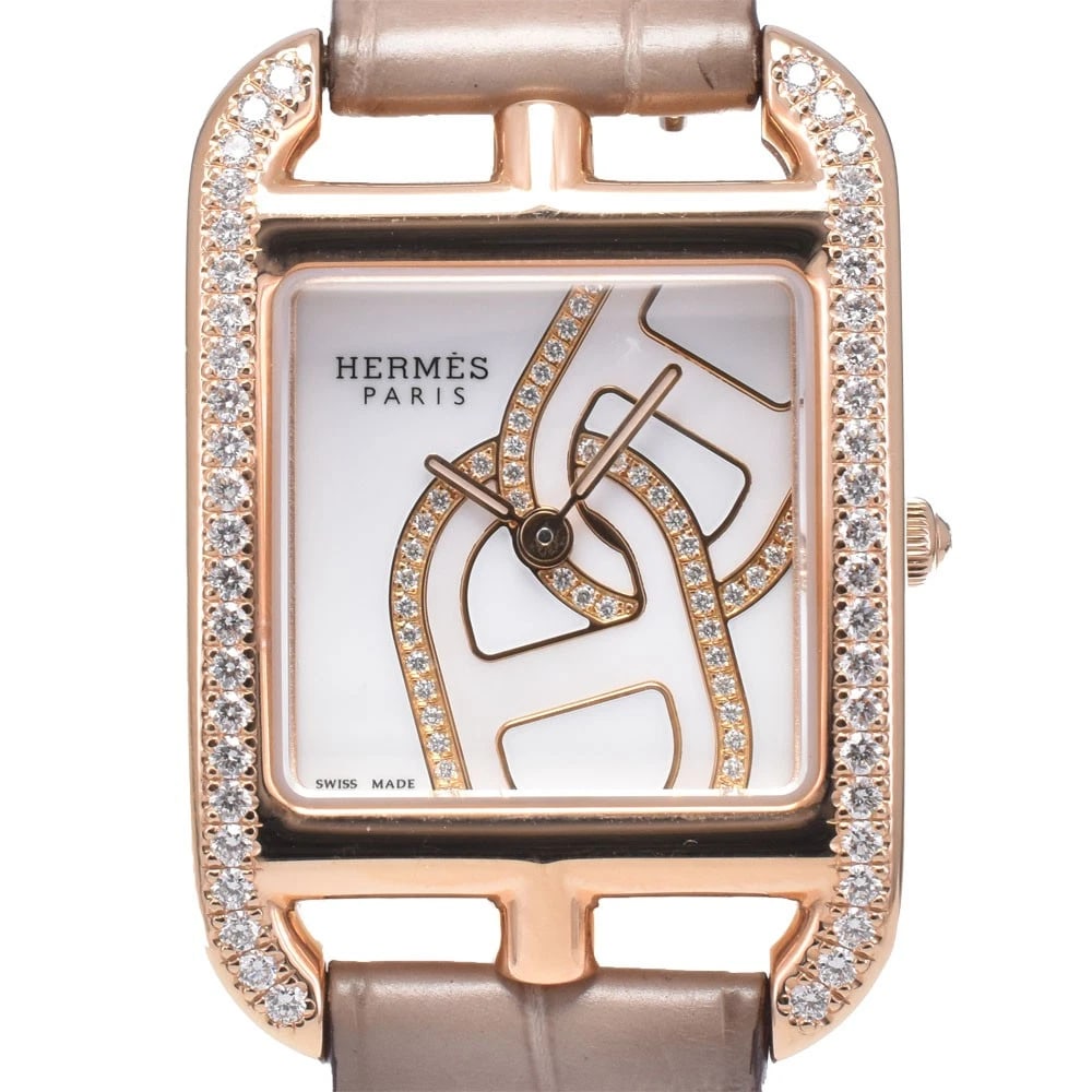 HERMES CAPE DIAMOND QUARTZ WATCH: Hermes Cape Diamond Quartz Watch Brand: HERMES Type/Style: Wristwatch Material: Band Material leather, Case Material K18PG Color: Case Color Silver, Band Color beige, Dial Color white Size: Case Size 
