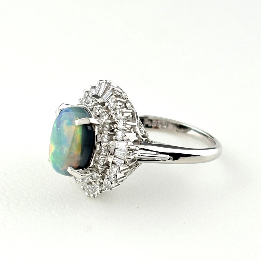 BLACK OPAL DESIGN RING: Black Opal Design Ring Brand: Unbranded Type/Style: Ring Material: Pt900, Main Stone Secondary Stone Natural Color: Silver Size: US 4 to 4.5 Accessories: None Accessories Notice: When purc