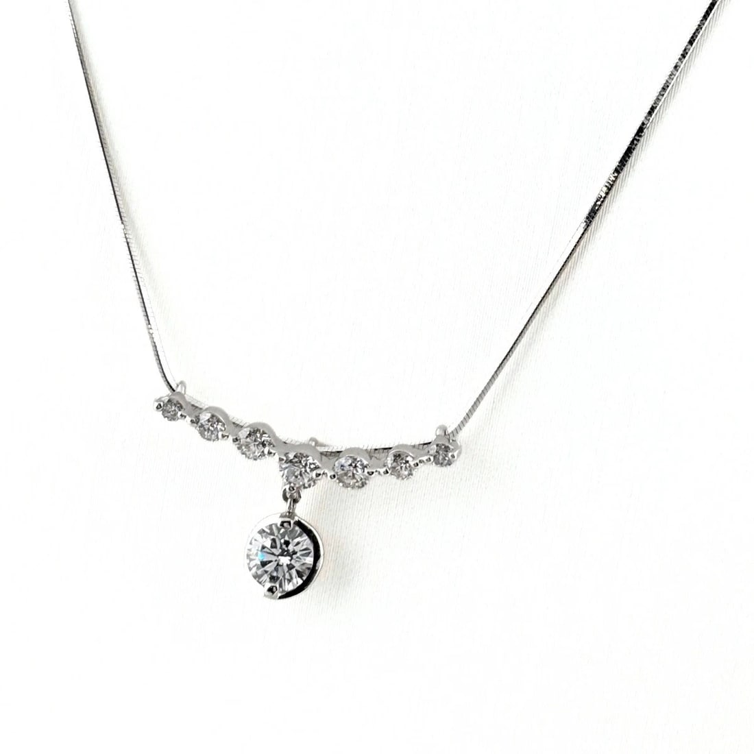 DIAMOND DESIGN NECKLACE: Diamond design necklace Brand: Unbranded Type/Style: Necklace Material: Pt900 ?Pt850, Main Stone Natural Color: Silver Size: Chain / code 45cm(17.7") Chain width 0.5mm(0.0") Pendant size
