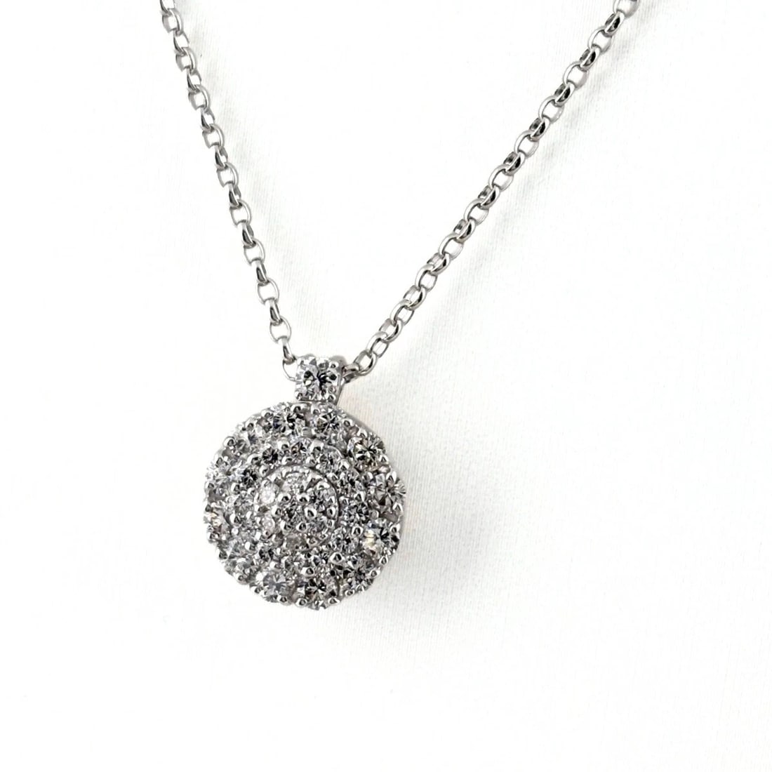 MELEE DIAMOND DESIGN NECKLACE: melee diamond design necklace Brand: Unbranded Type/Style: Necklace Material: 18K WG, Color: WG Size: Chain / code 41cm(16.1") Pendant size 15.6?12.5mm(0.6") Accessories: None Accessories Notice: