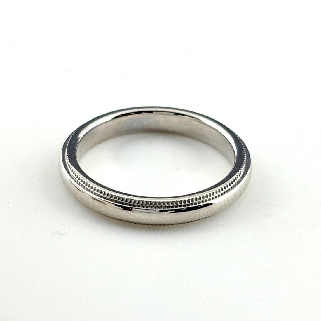 TIFFANY&CO. MILGRAIN BAND RING: TIFFANY&Co. milgrain band ring Brand: TIFFANY&Co. Type/Style: Ring Material: Pt950, Color: PT Size: US 5 Accessories: None Accessories Notice: When purchasing pre-owned goods, please refer to the