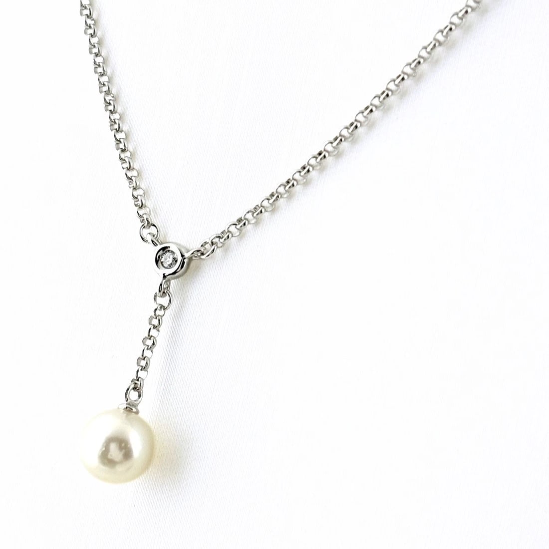 TASAKI PEARL NECKLACE: TASAKI Pearl Necklace Brand: TASAKI Type/Style: Necklace Material: 18K WG, Main Stone Pearl Color: WG Size: Chain / code 39cm(15.4") Pendant size 21.2?6.6mm(0.8") Accessories: None Accessories