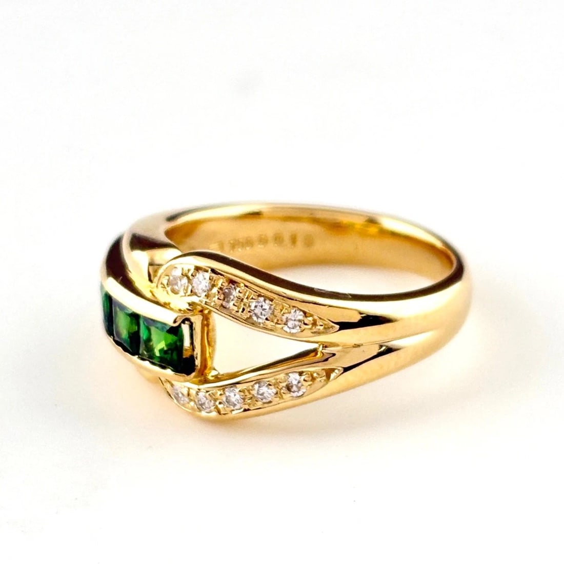 POLA GREEN GARNET DESIGN RING: POLA Green Garnet Design Ring Brand: POLA Type/Style: Ring Material: 18K YG, Main Stone Green garnet Color: YG Size: US 5 to 5.5 Accessories: None Accessories Notice: When purchasing pre-owned goods,