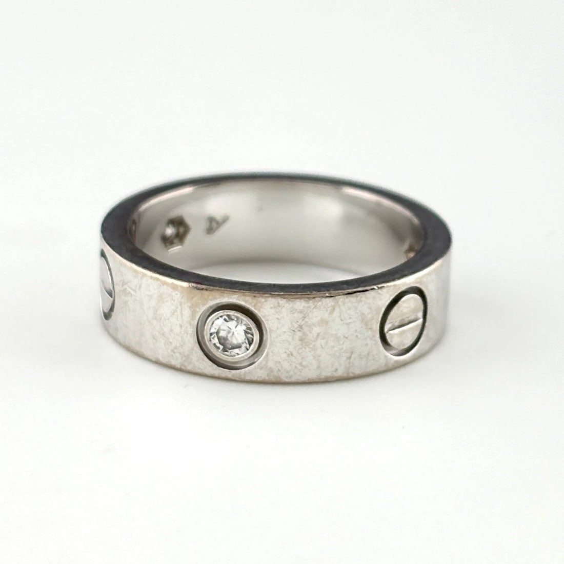 CARTIER LOVE HALF RING: CARTIER Love Half Ring Brand: CARTIER Type/Style: Ring Material: 750, Color: None Size: US 7 to 7.5 Accessories: None Accessories Notice: When purchasing pre-owned goods, please refer to the photos