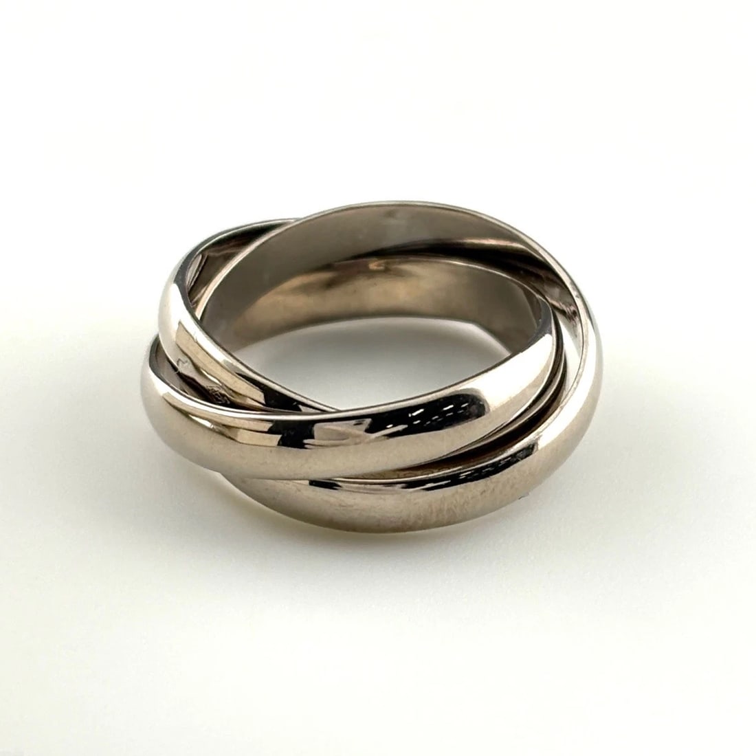 CARTIER TRINITY RING: CARTIER Trinity Ring Brand: CARTIER Type/Style: Ring Material: 750, Color: None Size: US 5.5 to 6 Accessories: None Accessories Notice: When purchasing pre-owned goods, please refer to the