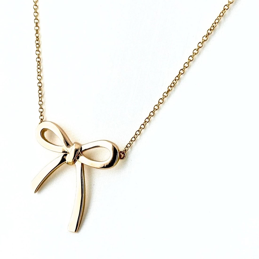 TIFFANY&CO. BOW NECKLACE: TIFFANY&Co. Bow necklace Brand: TIFFANY&Co. Type/Style: Necklace Material: 18K PG, Color: PG Size: Chain / code 40cm(15.7") Pendant size 22.2?22.4mm(0.9") Accessories: None Accessories Notice: When