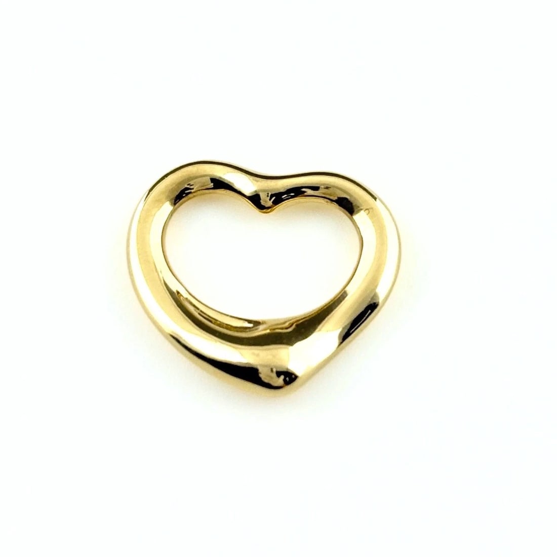 TIFFANY&CO. OPEN HEART TOP PENDANT HEAD: TIFFANY&Co. Open heart top Pendant Head Brand: TIFFANY&Co. Type/Style: Pendant Head Material: 18K YG, Color: YG Size: Pendant size 14.0?15.6mm(0.6") Inside diameter of the bail 6.0?10.8mm(0.2")