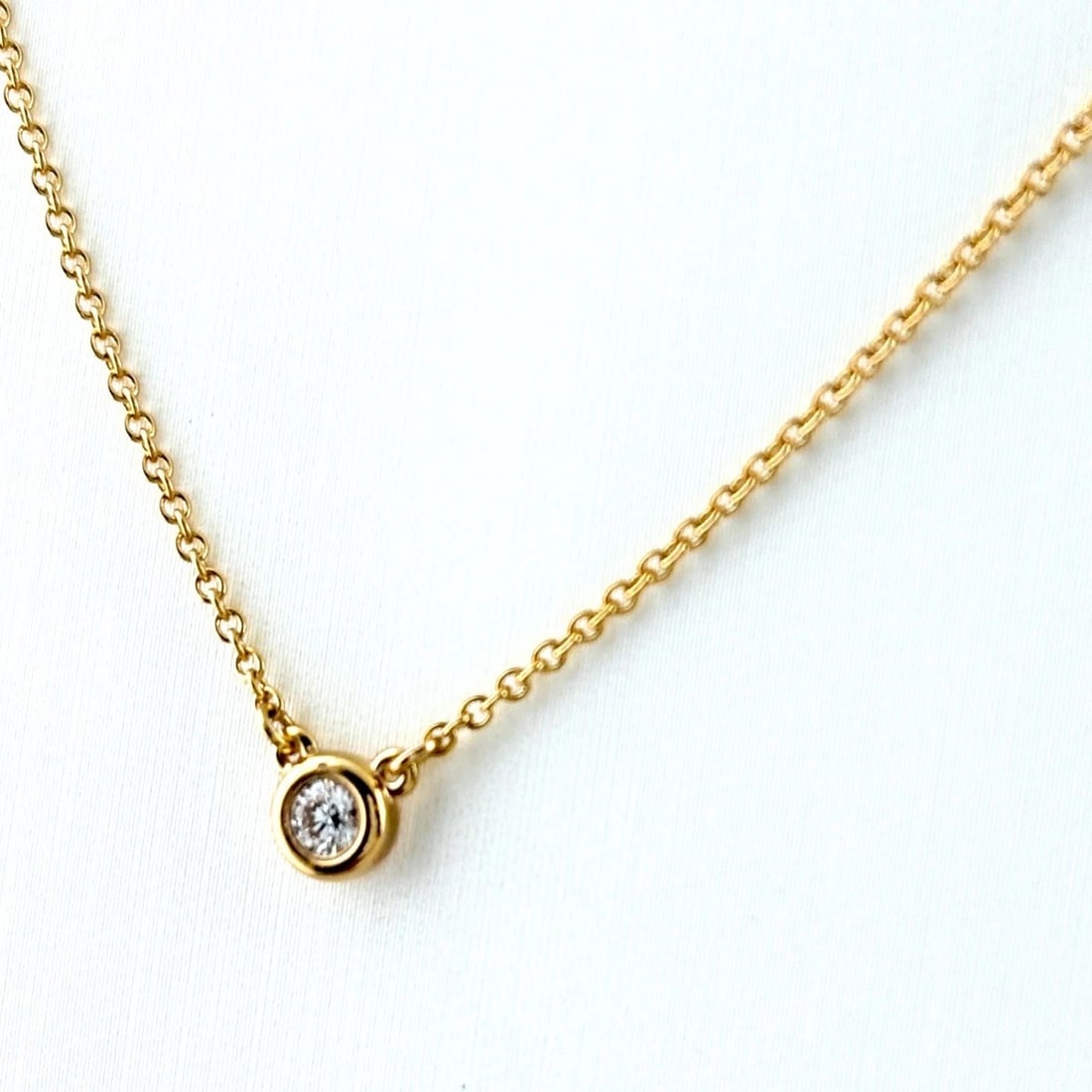 TIFFANY&CO. ELSA PERETTI BY THE YARD NECKLACE: TIFFANY&Co. Elsa Peretti By the Yard Necklace Brand: TIFFANY&Co. Type/Style: Necklace Material: 18K YG, Color: YG Size: Chain / code 41cm(16.1") Pendant size 4.4?4.4mm(0.2") Accessories: None