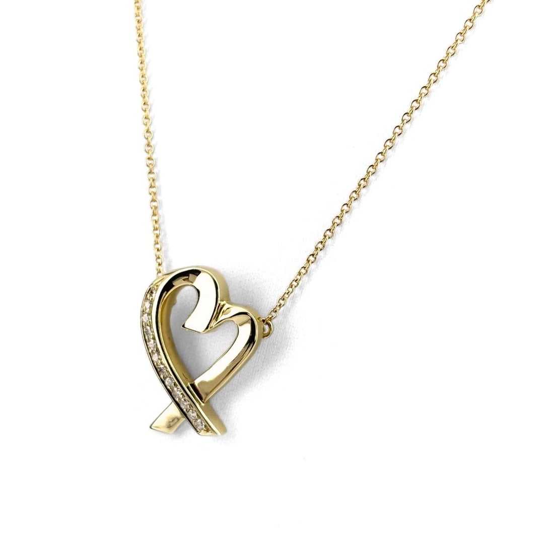TIFFANY&CO. RUBBING HEART NECKLACE: TIFFANY&Co. Rubbing Heart Necklace Brand: TIFFANY&Co. Type/Style: Necklace Material: 18K YG, Color: YG Size: Chain / code 47cm(18.5") Pendant size 19.0?15.2mm(0.7") Accessories: None Acces