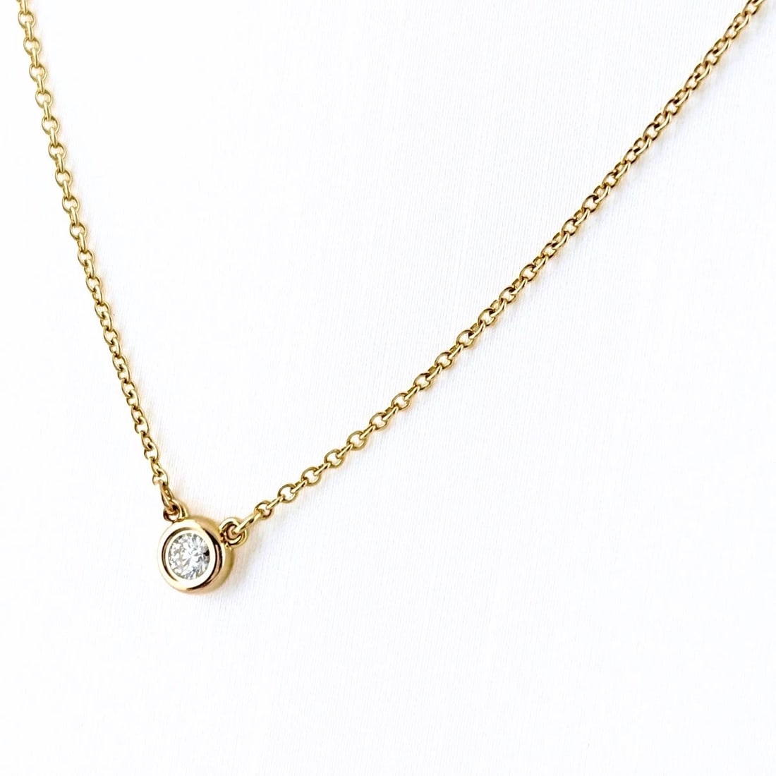 TIFFANY&CO. BY THE YARD NECKLACE: TIFFANY&Co. By the yard Necklace Brand: TIFFANY&Co. Type/Style: Necklace Material: 750 PG, Color: PG Size: Chain / code 41cm(16.1") Pendant size 4.4?4.4mm(0.2") Accessories: None Accessori