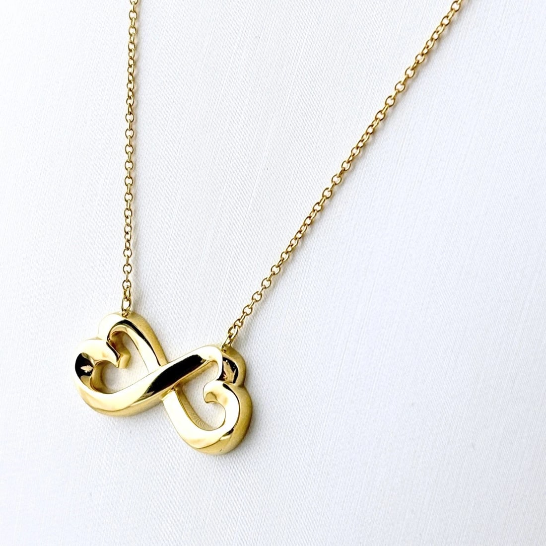 TIFFANY&CO. DOUBLE LOVING HEART NECKLACE: TIFFANY&Co. Double Loving Heart Necklace Brand: TIFFANY&Co. Type/Style: Necklace Material: 18K YG, Color: YG Size: Chain / code 47cm(18.5") Pendant size 21.8?11.5mm(0.9") Accessories: None