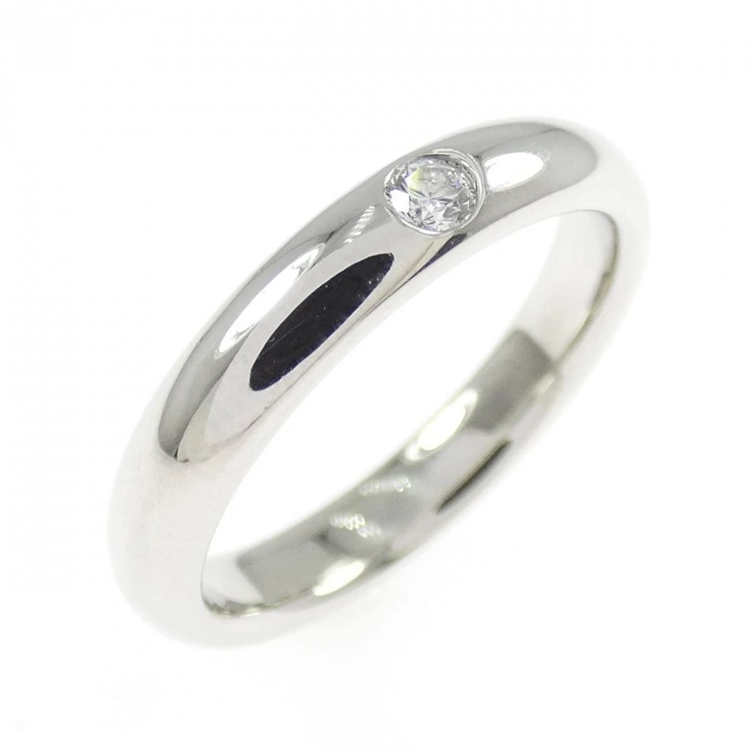 HARRY WINSTON ROUND WEDDING RING (1 of 2)