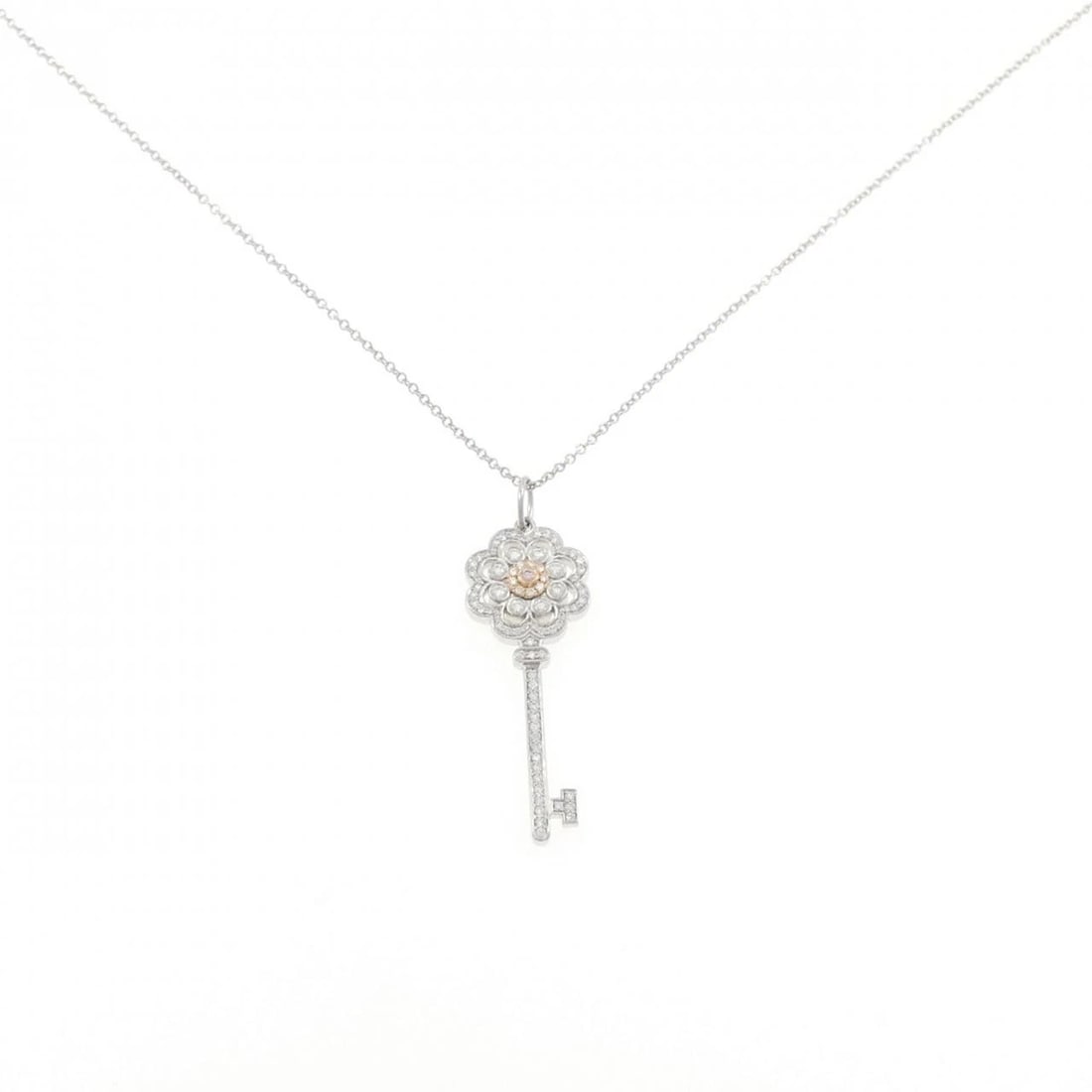 TIFFANY&CO. ROSE KEY NECKLACE: TIFFANY&Co. Rose Key Necklace Brand: TIFFANY&Co. Type/Style: TIFFANY&Co. Necklace Material: Platinum/750 pink gold, Main Stone Natural Color: SILVER,PINK GOLD Size: Length45cm Actual Size Pendant
