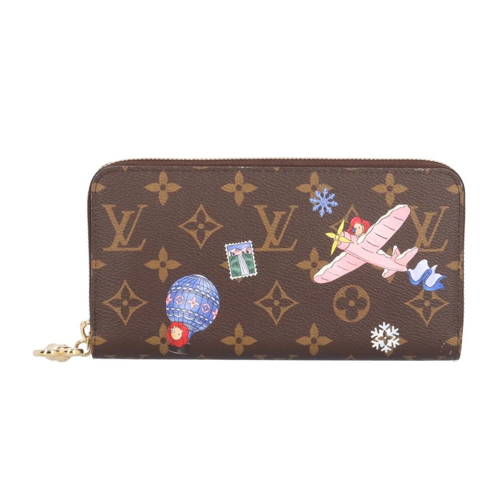 LOUISVUITTON VIVIENNE WINTER TRAVEL PURSE MONOGRAM CANVAS: LOUISVUITTON Vivienne Winter Travel purse Monogram canvas Brand: LOUIS VUITTON Type/Style: purse Material: Exterior Material Monogram canvas Color: Exterior color multicolor Size: W7.7 x H4.1x D1.0inc