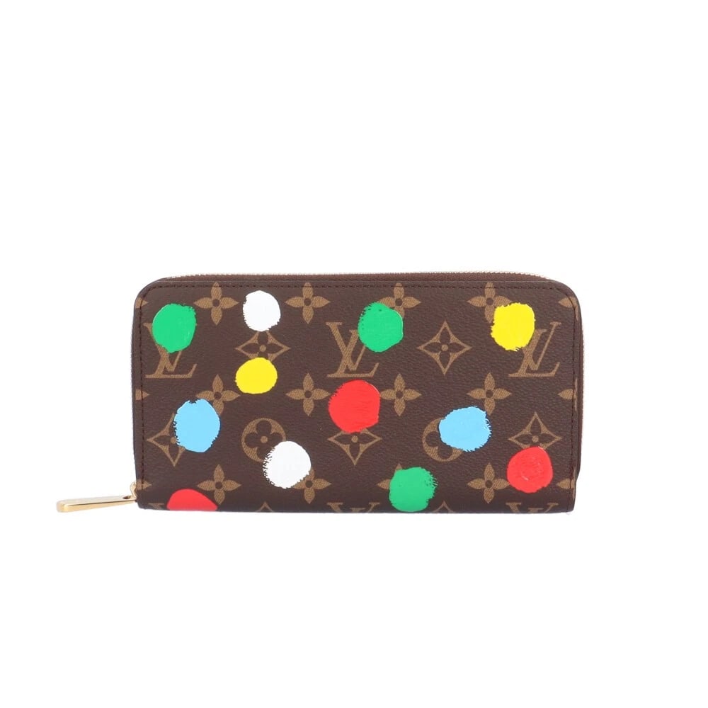 LOUIS VUITTON MONOGRAM CANVAS ZIPPY WALLET COLLABORATION: LOUIS VUITTON Monogram canvas Zippy Wallet collaboration Brand: LOUIS VUITTON Type/Style: purse Material: Exterior Material Monogram canvas Color: Exterior color multicolor Size: W7.5 x H3.9x