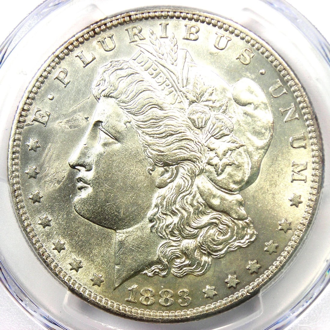 1883-S MORGAN SILVER DOLLAR $1 COIN: 1883-S Morgan Silver Dollar $1 Coin Year: 1883 Denomination: $1 Country of Origin: United States Accessories: None Accessories Notice: When purchasing pre-owned goods, please refer to the photos of th