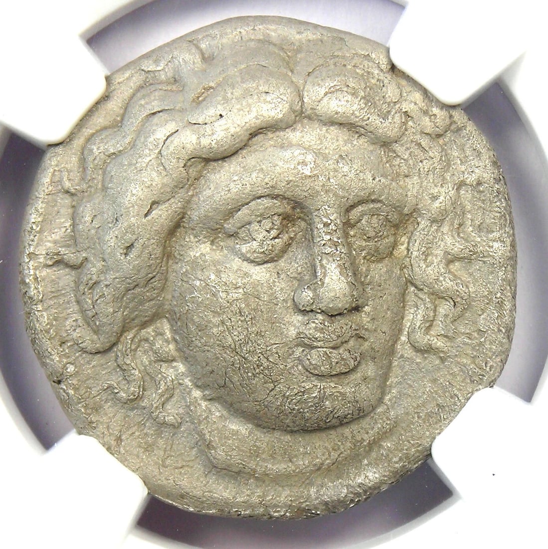 CARIA RHODES AR TETRADRACHM SILVER HELIOS COIN: Caria Rhodes AR Tetradrachm Silver Helios Coin Year: 305 BC Denomination: Tetradrachm Country of Origin: Greece Accessories: None Accessories Notice: When purchasing pre-owned goods, please refer to t