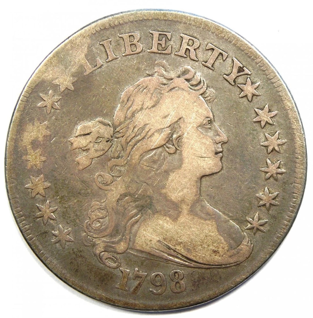 1798 DRAPED BUST SILVER DOLLAR $1 COIN: 1798 Draped Bust Silver Dollar $1 Coin Year: 1798 Denomination: $1 Country of Origin: United States Accessories: None Accessories Notice: When purchasing pre-owned goods, please refer to the photos of