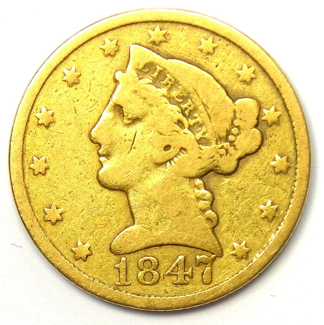 1847-C LIBERTY GOLD HALF EAGLE $5 - CHARLOTTE GOLD COIN: 1847-C Liberty Gold Half Eagle $5 - Charlotte Gold Coin Year : 1847 Denomination : $5 Country of Origin : United States Accessories: None Accessories Notice: When purchasing pre-owned goods, please re