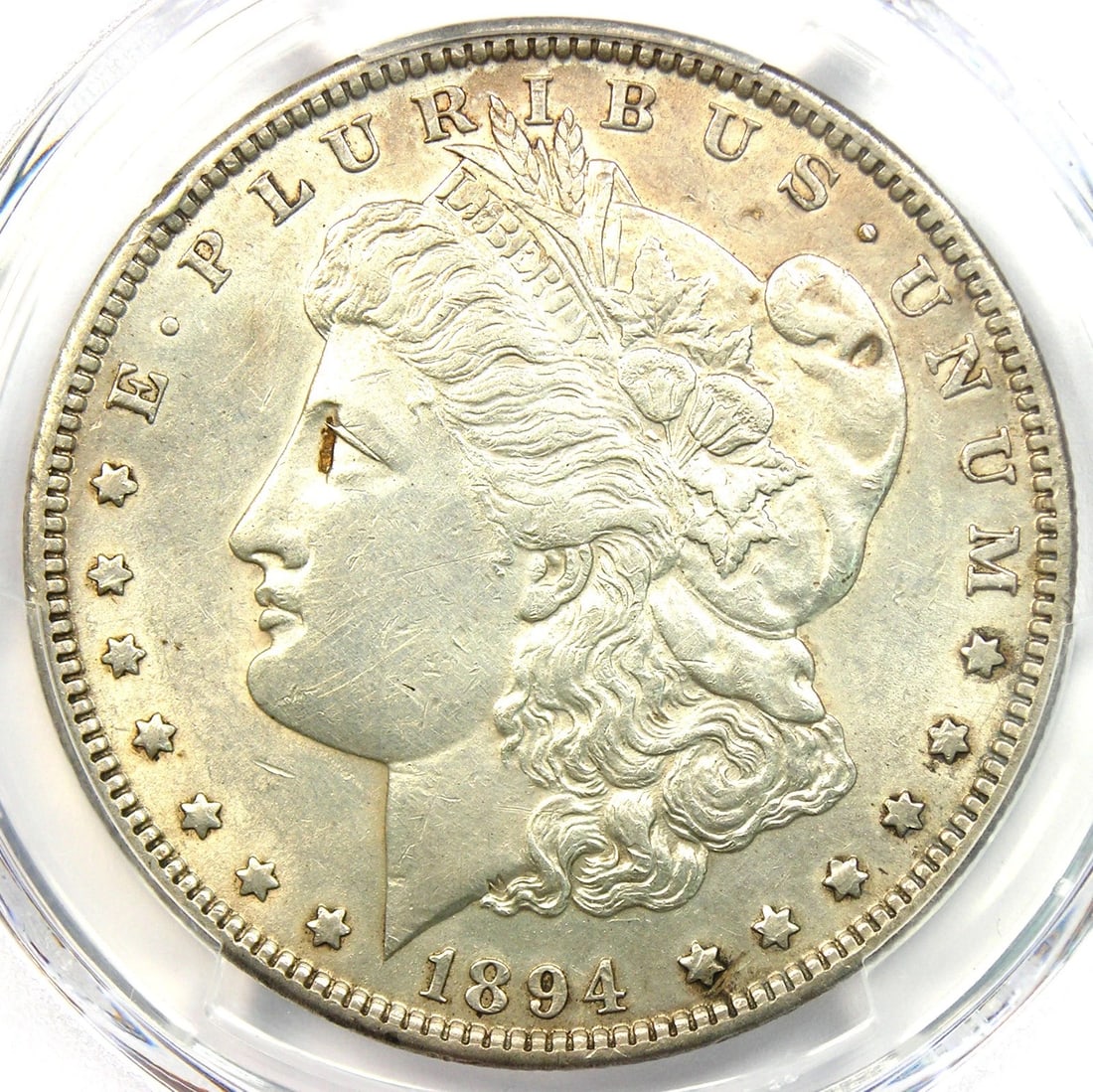 1894-P MORGAN SILVER DOLLAR $1 COIN: 1894-P Morgan Silver Dollar $1 Coin Year: 1894 Denomination: $1 Country of Origin: United States Accessories: None Accessories Notice: When purchasing pre-owned goods, please refer to the photos of th