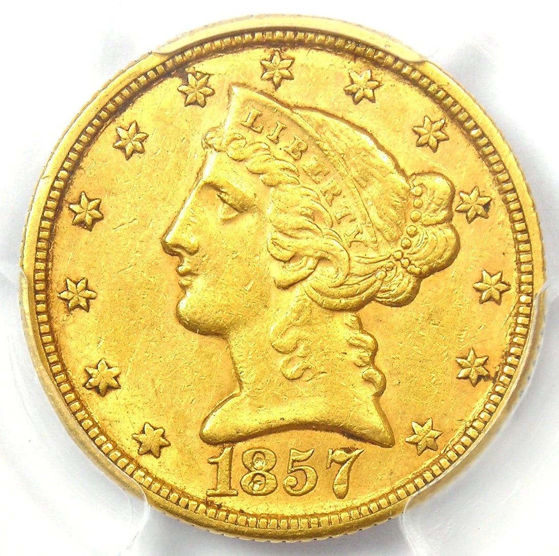 1857-C LIBERTY GOLD HALF EAGLE $5: 1857-C Liberty Gold Half Eagle $5 Year: 1857 Denomination: $5 Country of Origin: United States Accessories: None Accessories Notice: When purchasing pre-owned goods, please refer to the photos of the 
