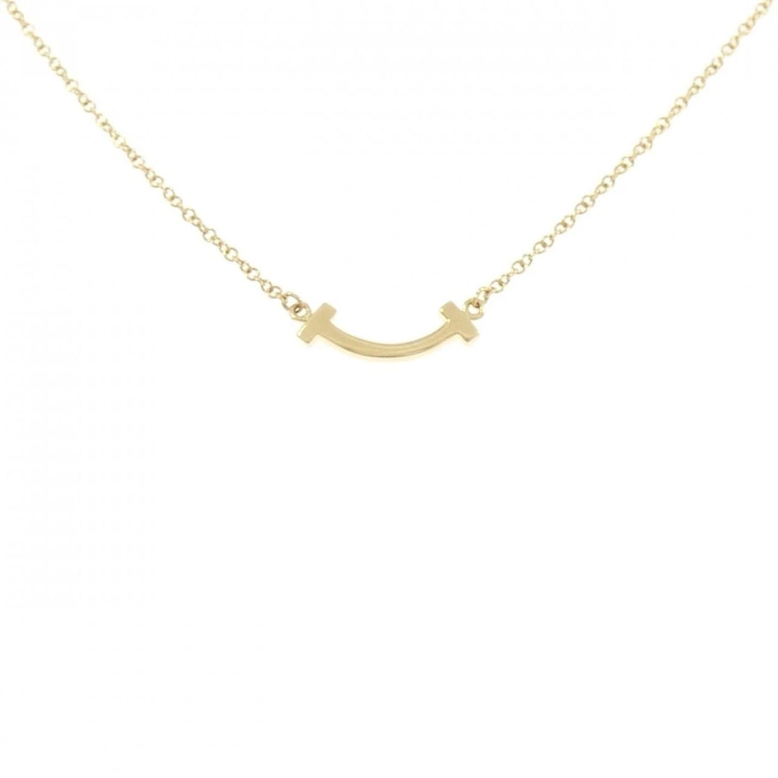 TIFFANY & CO. T SMILE MINI NECKLACE: TIFFANY & Co. T Smile Mini Necklace Brand: TIFFANY&Co. Type/Style: TIFFANY&Co. Necklace Material: 750 yellow gold, Color: Yellow Gold Size: length40?45cmActual Size Pendant length approx. x width appr