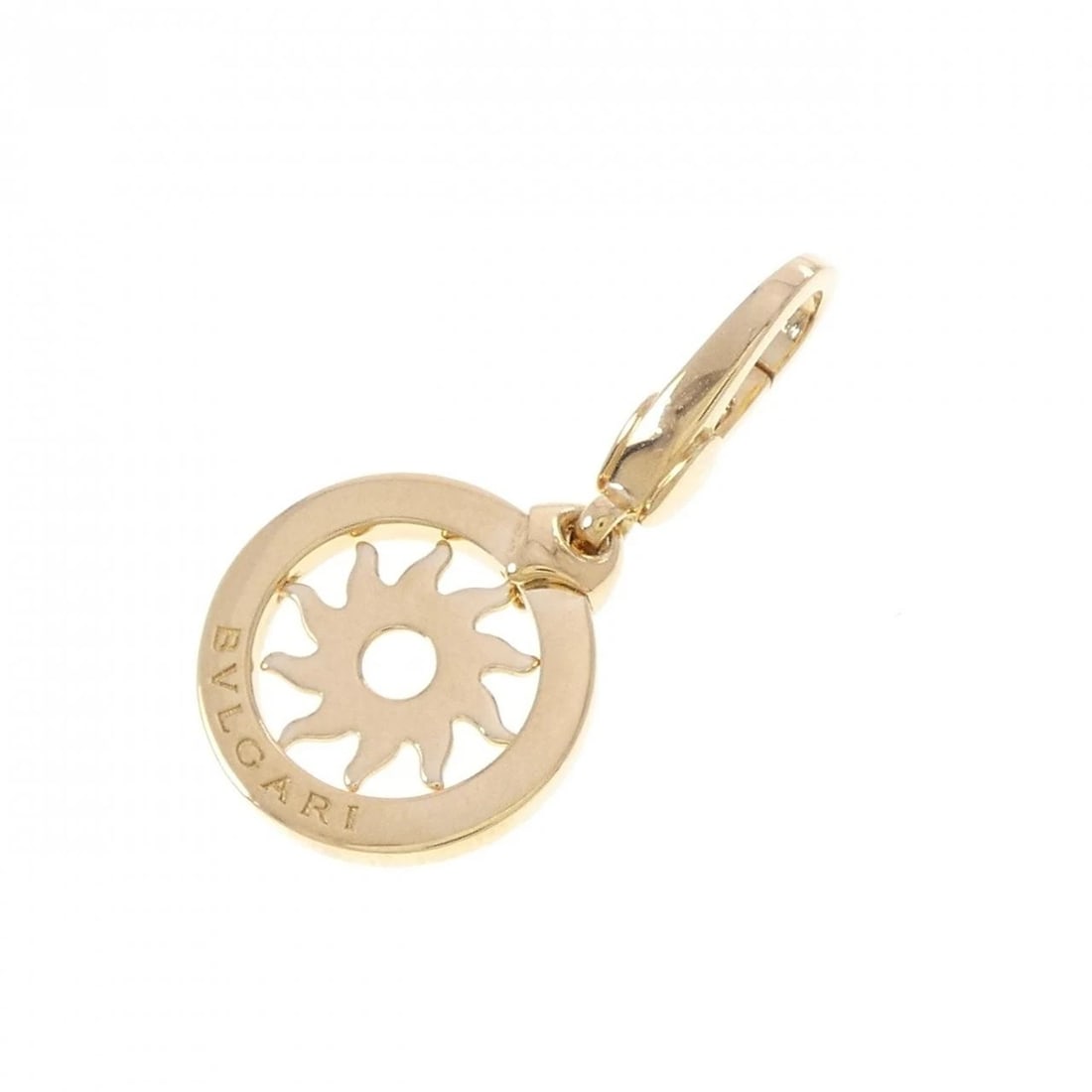 BVLGARI TONDO SUN CHARM: Bvlgari Tondo Sun Charm Brand: BVLGARI Type/Style: Bvlgari Pendant/Brooch Material: 750 yellow gold, Color: Yellow Gold Size: Actual Size Approximate dimensions: 29.2mm (height) x 14.4mm (width)