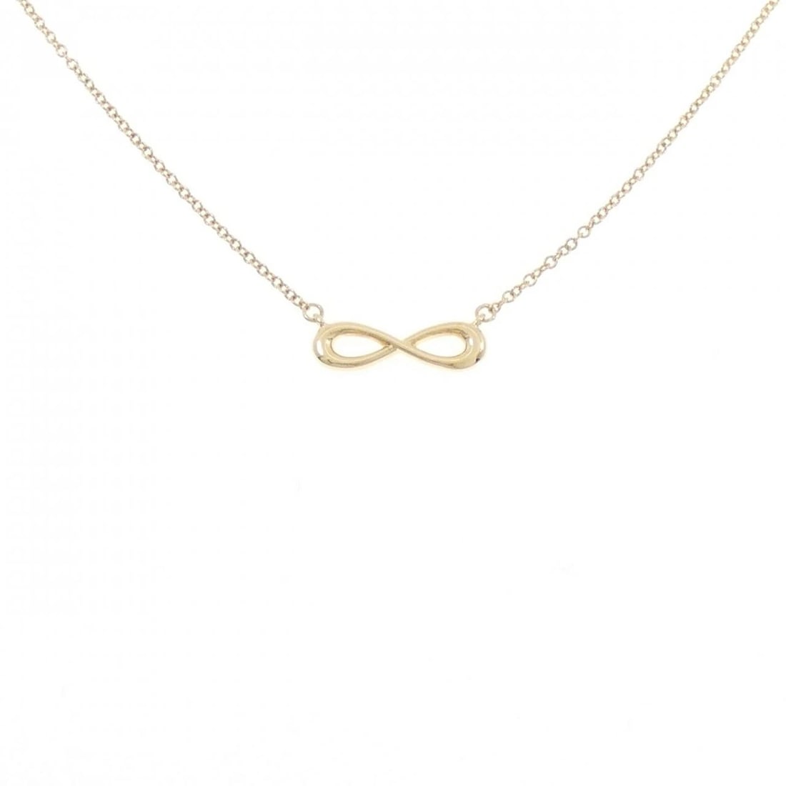 TIFFANY&CO. INFINITY NECKLACE: TIFFANY&Co. Infinity Necklace Brand: TIFFANY&Co. Type/Style: TIFFANY&Co. Necklace Material: 750 yellow gold, Color: yellow gold Size: 41?46cm Pendant length approx. x width approx.: 4.2mmx14.4mm