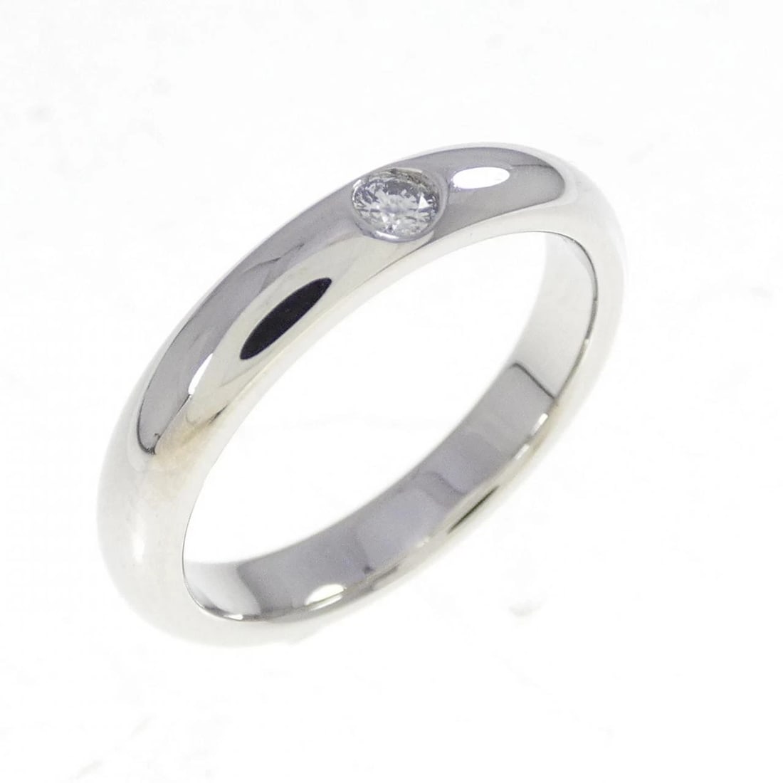 HARRY WINSTON ROUND WEDDING RING (1 of 4)