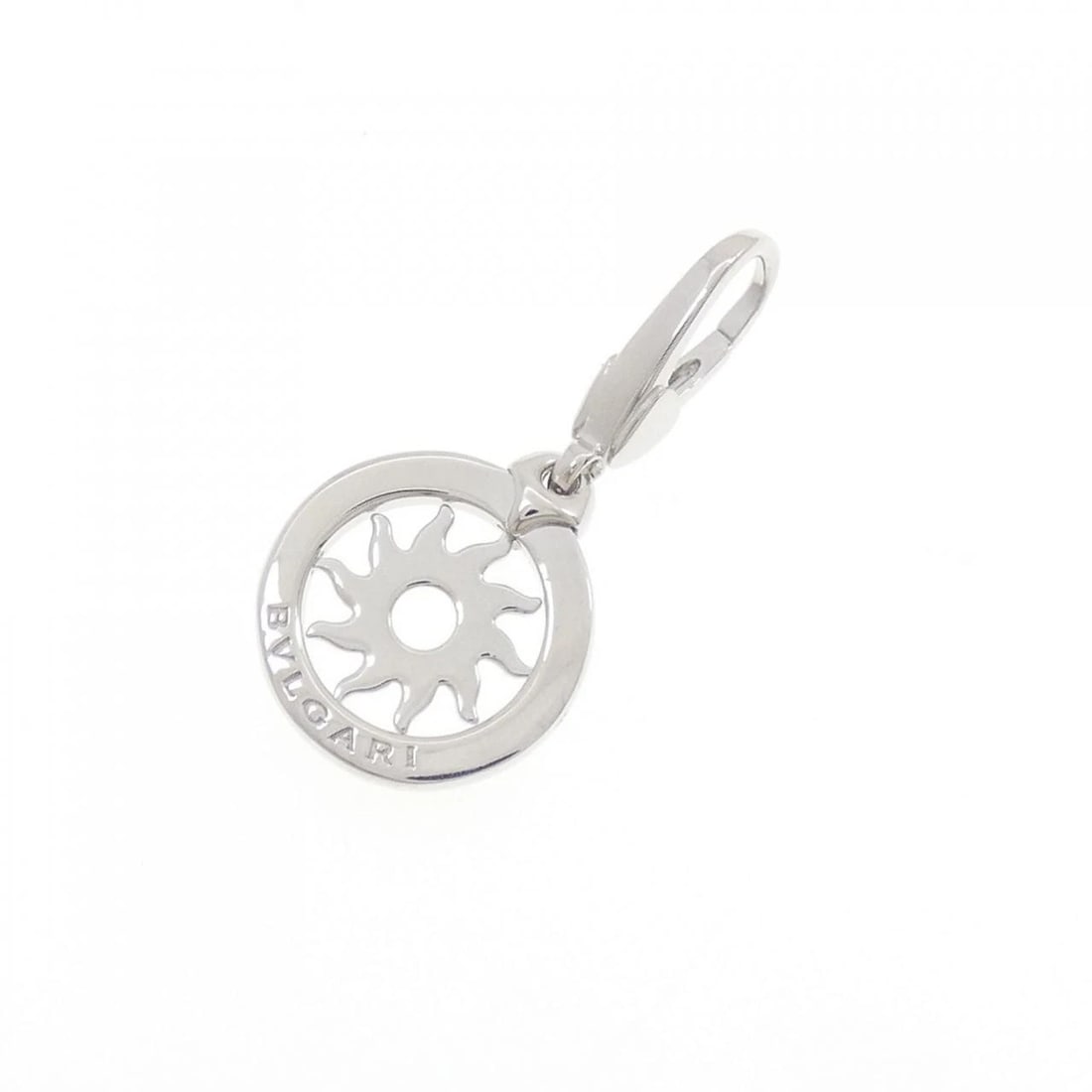 BVLGARI TONDO SUN CHARM: Bvlgari Tondo Sun Charm Brand: BVLGARI Type/Style: Bvlgari Pendant/Brooch Material: 750 white gold, Color: white gold Size: Approx. length x width: 29.5mm x 14.4mm Accessories: None Accessories