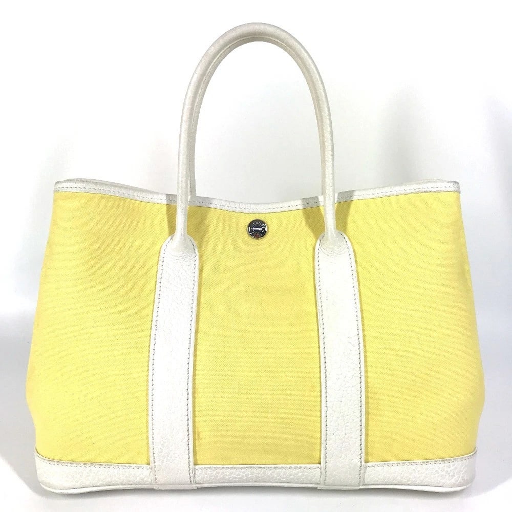 HERMES GARDEN PARTY TPM GARDEN PARTY TPM BAG: HERMES Garden Party TPM Garden Party TPM Bag Brand: HERMES Type/Style: Hand Bag Material: Toile H / Leather Color: yellowxwhite Size: W11.8xH8.3xD5.1inch / W30cmxH21cmxD13cm Accessories: None