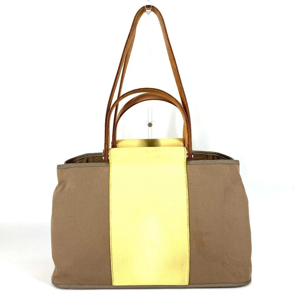 HERMES BICOLOR KABAK ELAN PM SHOULDER BAG TOTE BAG: HERMES Bicolor Kabak Elan PM Shoulder Bag Tote Bag Brand: HERMES Type/Style: Tote Bag Material: Leather/Canvas Color: Biege / Yellow Size: W15.6xH9.1xD5.7inch / W39.5cmxH23cmxD14.5cm Accessories: