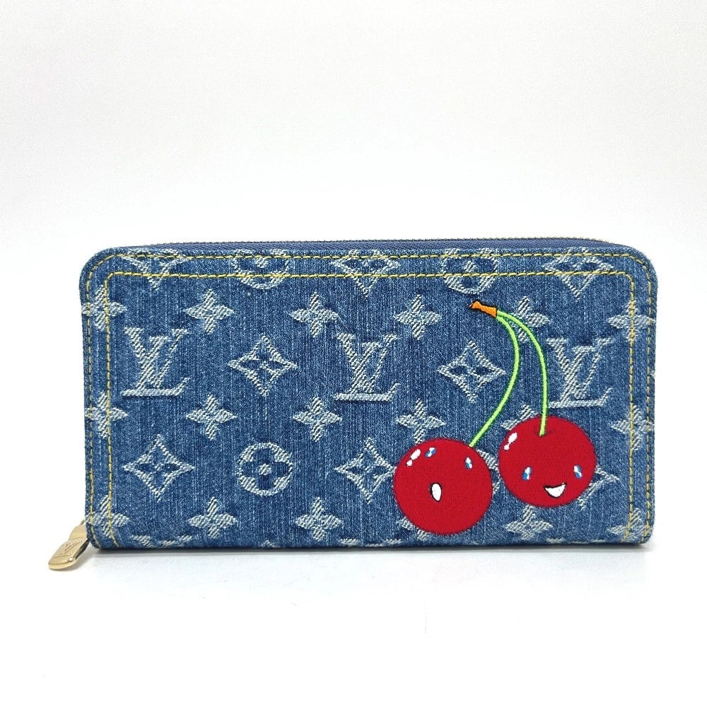LOUIS VUITTON MURAKAMI TAKASHI MONOGRAM WALLET: LOUIS VUITTON Murakami Takashi Monogram Wallet Brand: LOUIS VUITTON Type/Style: Long Wallet Material: Monogram Denim Color: blue Size: W7.7xH4.1xD1.0inch / W19.5cmxH10.5cmxD2.5cm Accessories: None