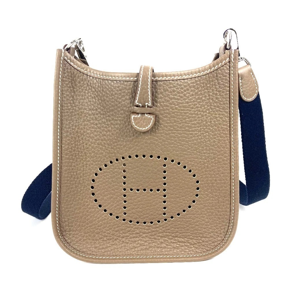HERMES EVELYNE TPM LONG CROSSBODY POCHETTE BAG: HERMES Evelyne TPM Long Crossbody Pochette bag Brand: HERMES Type/Style: Shoulder Bag Material: Taurillon Clece Color: Gray based Navy Size: W6.7xH7.3xD2.2inch / W17cmxH18.5cmxD5.5cm Accessories: