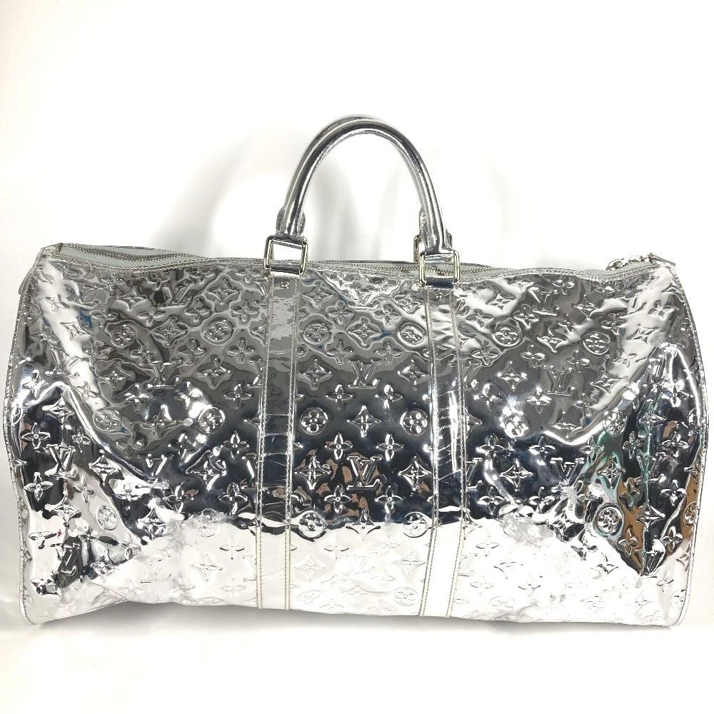 LOUIS VUITTON MONOGRAMMIROIR KEEPALL55 DUFFLE BAG: LOUIS VUITTON MonogramMiroir Keepall55 Duffle Bag Brand: LOUIS VUITTON Type/Style: Duffle Bag Material: Leather Color: Argent / Silver Size: W22.0xH12.0xD9.6inch / W56cmxH30.5cmxD24.5cm Accessorie