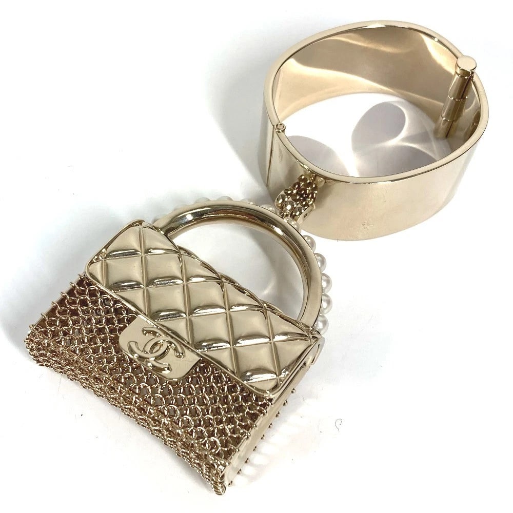 CHANEL MATELASSE QUILTED HAND BAG: CHANEL Matelasse Quilted Hand Bag Brand: CHANEL Type/Style: Bangle Material: Metal Color: Gold Size: Band Length: 6.5inch / 16.5cm Band Width: 11.8inch / 30mm Accessories: None Accessories