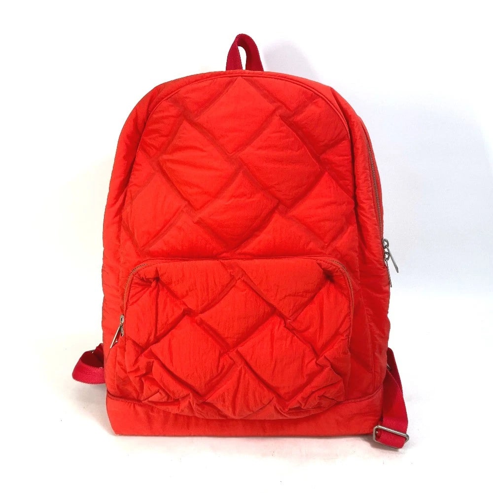 BOTTEGA VENETA BACKPACK MAXI INTRECCIATO BAG: BOTTEGA VENETA Backpack Maxi Intrecciato bag Brand: BOTTEGA VENETA Type/Style: Backpack Material: Nylon Color: Tomato / Red Size: W12.6xH15.7xD4.1inch / W32cmxH40cmxD10.5cm Accessories: None <