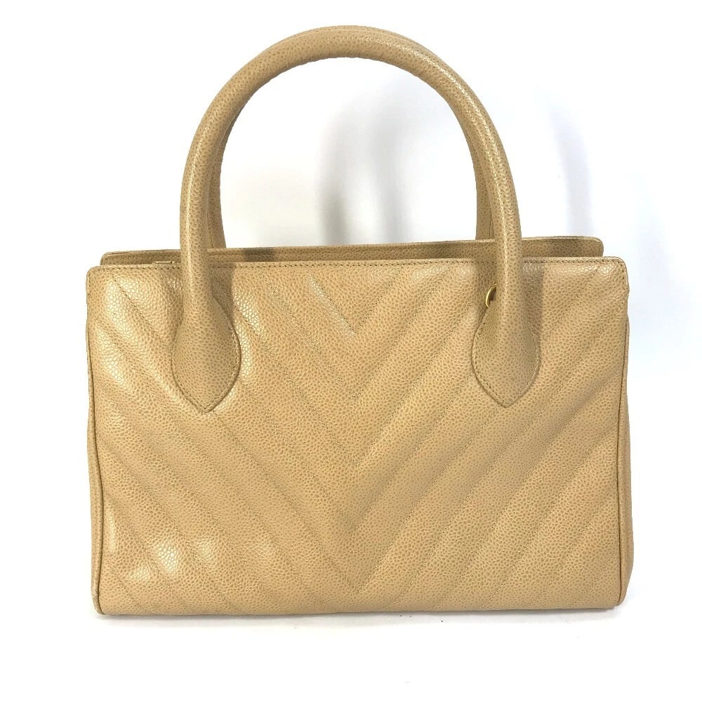 CHANEL CHEVRON V-STITCH TOTE BAG HAND BAG: CHANEL Chevron V-Stitch Tote Bag Hand Bag Brand: CHANEL Type/Style: Hand Bag Material: Caviar Leather Color: Beige Size: W10.6xH7.3xD3.9inch / W27cmxH18.5cmxD10cm Accessories: None Accesso