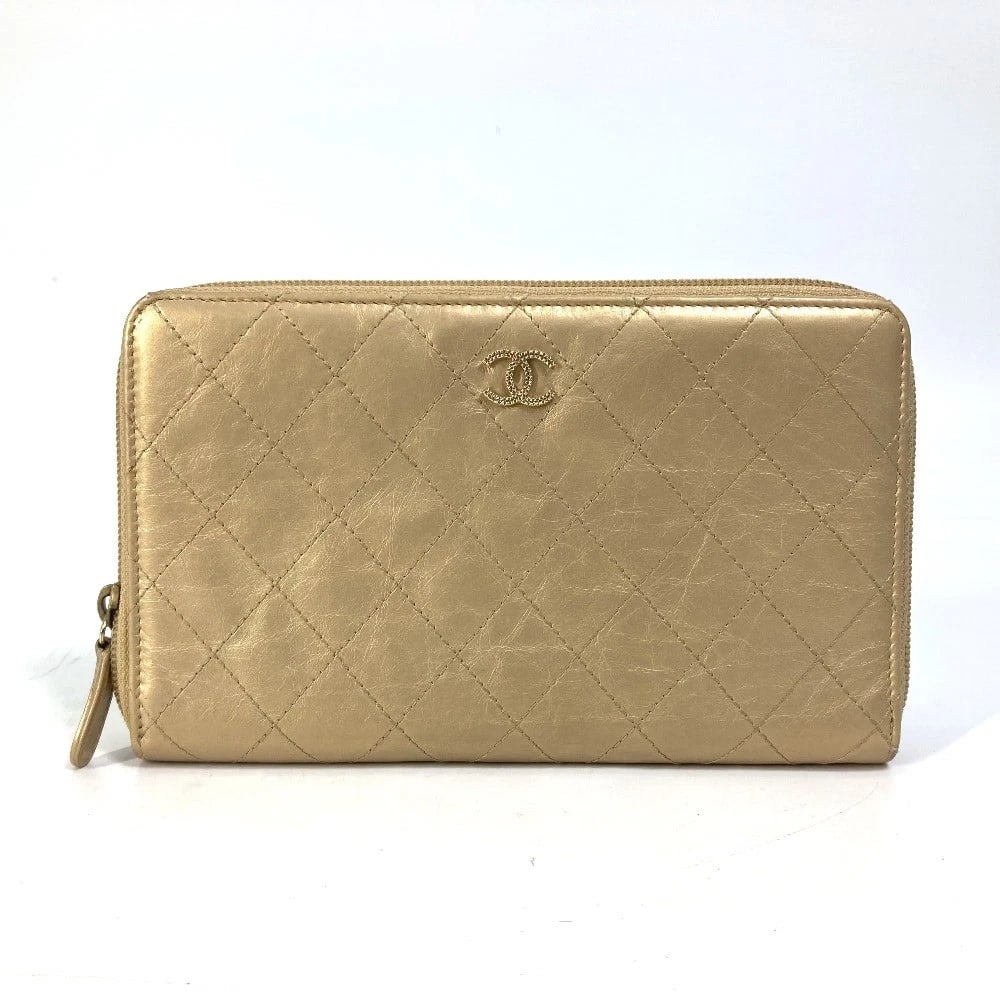 CHANEL CC MARK CC MATELASSE QUILTED ZIP AROUND LONG WALLET: CHANEL CC Mark CC Matelasse Quilted Zip Around Long Wallet Brand: CHANEL Type/Style: Long Wallet Material: Calfskin Color: Gold Size: W7.7xH4.5inch / W19.5cmxH11.5cm Accessories: None Accessories