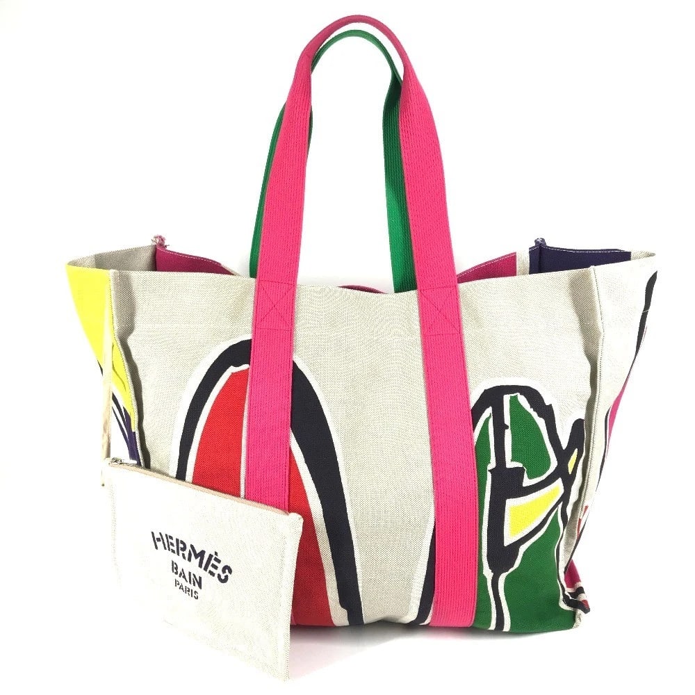 HERMES TOTE BAG WITH POUCH SEBAS DE PLAGE LOGO SHOULDER BAG: HERMES Tote Bag with pouch Sebas de Plage logo Shoulder Bag Brand: HERMES Type/Style: Shoulder Bag Material: cotton Color: Multicolor Size: W18.5xH15.0xD9.6inch / W47cmxH38cmxD24.5cm Accessories: