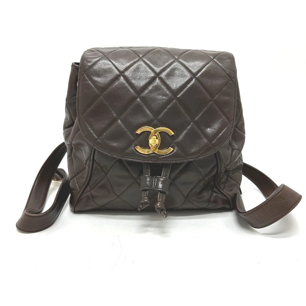 CHANEL CC CC MARK MATELASSE CHAIN BACKPACK: CHANEL CC CC Mark Matelasse Chain Backpack Brand: CHANEL Type/Style: Backpack Material: Lambskin Leather Color: Brown x Gold Hardware Size: W9.3xH9.4xD3.5inch / W23.5cmxH24cmxD9cm Accessories: Non
