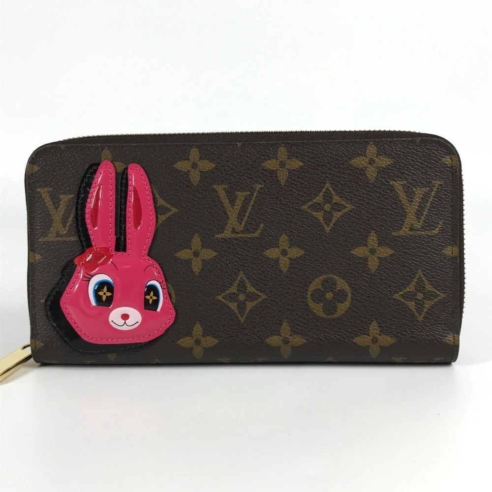 LOUIS VUITTON MONOGRAM NICOLAS GHESQUIERE: LOUIS VUITTON Monogram Nicolas Ghesquiere Brand: LOUIS VUITTON Type/Style: Long Wallet Material: Monogram Canvas Color: pink x Brown Size: W7.5xH3.9inch / W19cmxH10cm Accessories: None Acc