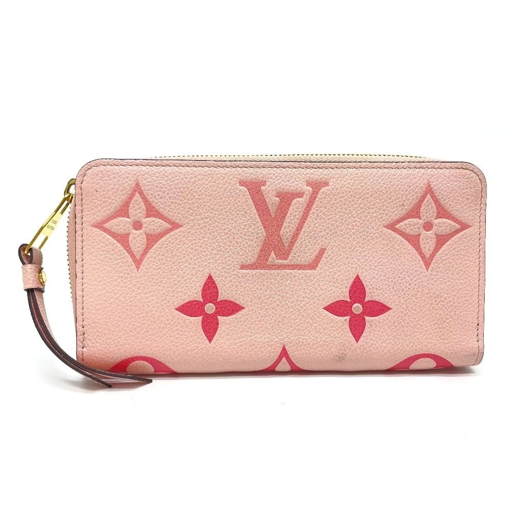 LOUIS VUITTON MONOGRAM EMPREINTE: LOUIS VUITTON Monogram Empreinte Brand: LOUIS VUITTON Type/Style: Long Wallet Material: Monogram Empreinte Leather Color: Bouton de Rose /Pink GoldHardware / pink Size: W7.7xH4.1xD0.7inch / W19.5cmxH1