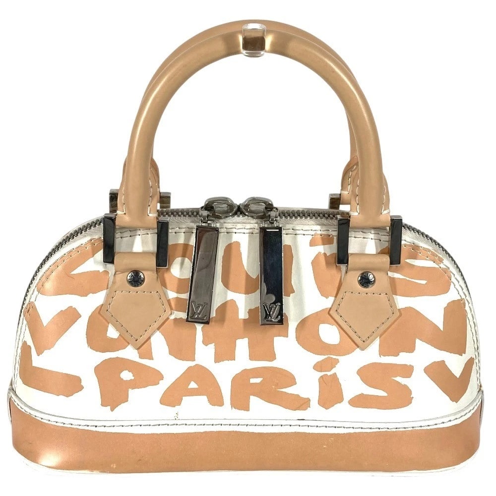 LOUIS VUITTON MONOGRAMGRAFFITI ALMA PM HAND BAG: LOUIS VUITTON MonogramGraffiti Alma PM Hand Bag Brand: Louis Vuitton Type/Style: Hand Bag Material: Leather Color: beigexwhite Size: W9.8xH4.9xD3.7inch / W25cmxH12.5cmxD9.5cm Accessories: None