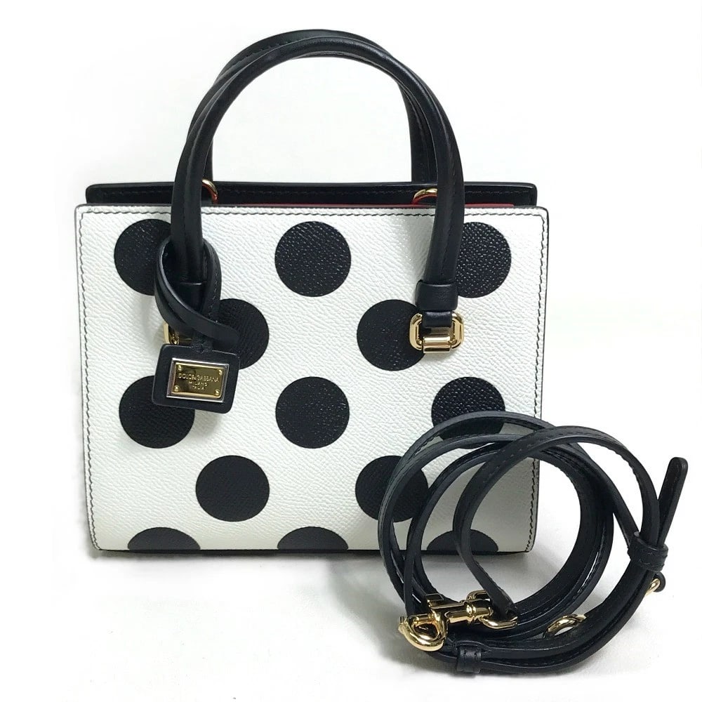 UNDOLCE&GABBANA DOT PATTERN HAND BAG MINI SHOULDER BAG: UNDOLCE&GABBANA Dot pattern Hand Bag Mini Shoulder Bag Brand: DOLCE&GABBANA Type/Style: Hand Bag Material: Leather Color: White x Black x Red Size: W6.7xH5.7xD2.8inch / W17cmxH14.5cmxD7cm