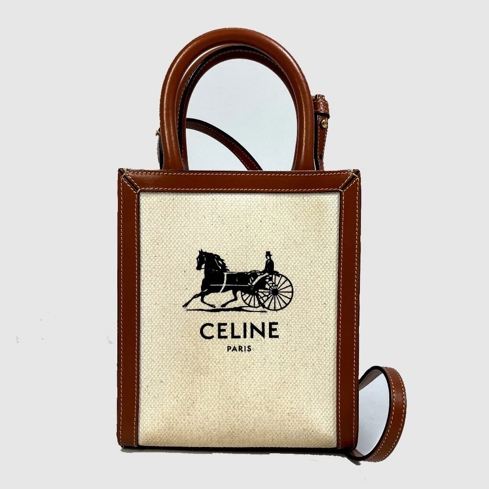 CELINE CARRIAGE VERTICAL CABAS MINI2WAY SHOULDER BAG: CELINE Carriage Vertical Cabas Mini2WAY Shoulder Bag Brand: CELINE Type/Style: Shoulder Bag Material: Canvas/Leather Color: natural / Beige Size: W6.7xH7.9xD2.0inch / W17cmxH20cmxD5cm Accessories:
